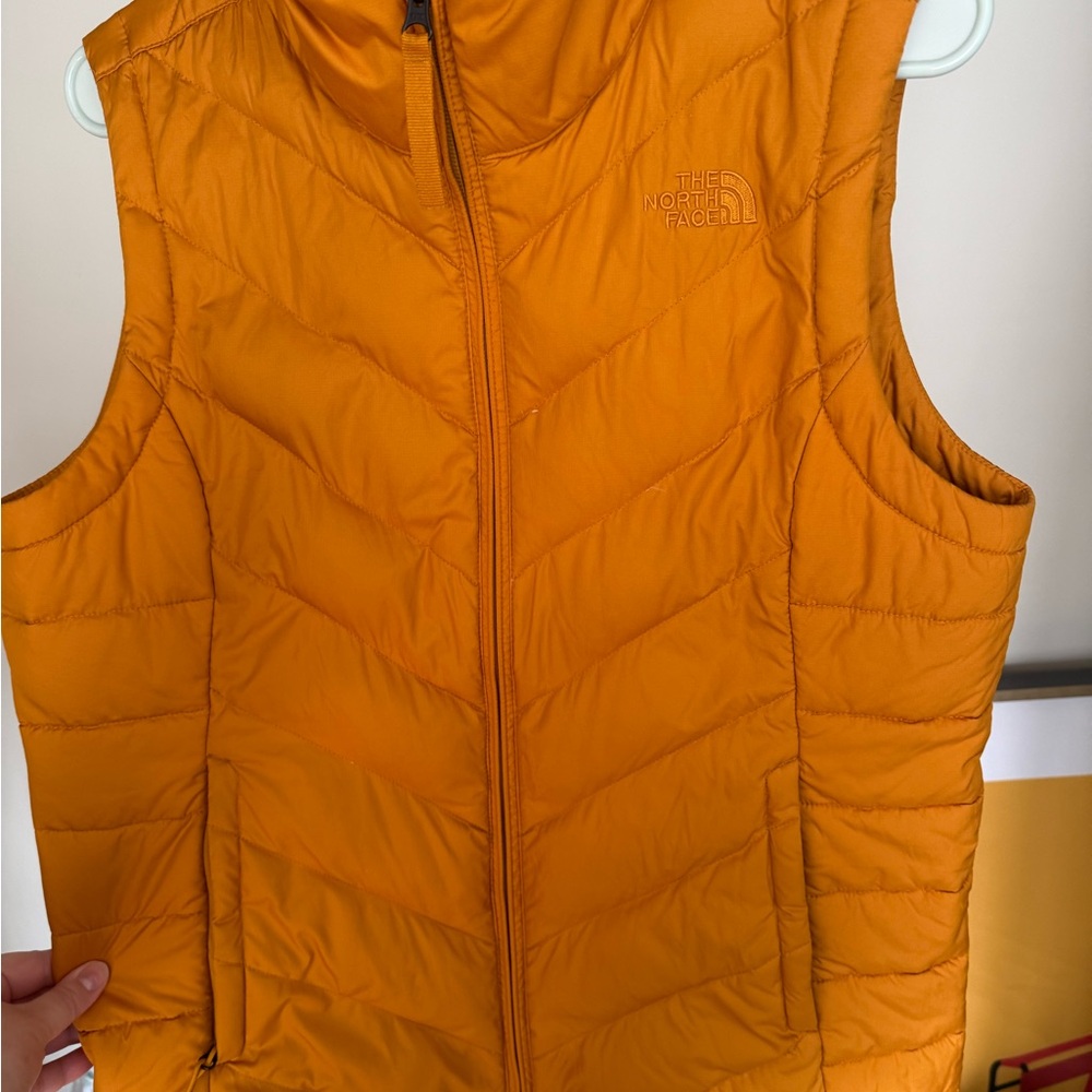 TWO VEST. Discounted! The North Face and Calvin Klein.
